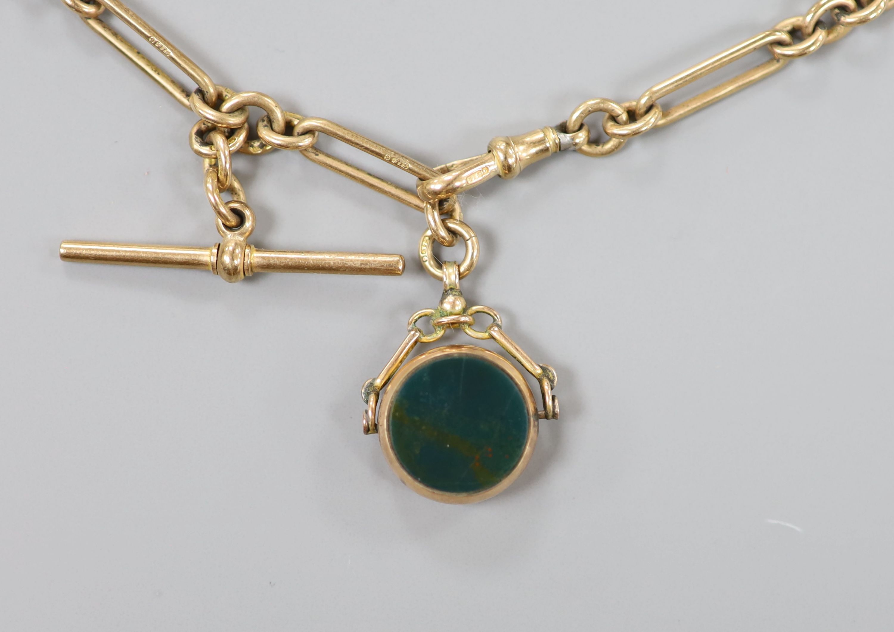 A 9ct gold watch albert, 30cm hung with a 9c, carnelian and bloodstone set spinning fob, gross weight 27.9 grams.